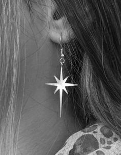 Gold plating or Silver 925 Star Earrings, designed as the star of Bethlehem, which makes them also a perfect Christmas gift. Star Long Dangle Earrings made of 14 karat gold plated brass or strling silver. These unique long dangle earrings feature beautiful matte gold plated over brass star dangling from ear wire. Chic and stylish earrings! These earrings measure approx 35/22 mm from the top of the star to the bottom of the star. Celestial Star-shaped Earrings For Pierced Ears, Celestial Silver Earrings With Star Charm, Nickel Free Celestial Earrings, Dangle Earrings With Star Charm, Celestial Star-shaped Pierced Earrings, Nickel-free Celestial Earrings, Sterling Silver Star-shaped Single Earring, Star-shaped Single Earring As Gift, Minimalist Star-shaped Jewelry With Ear Wire