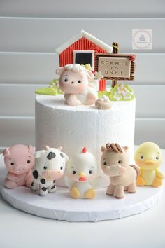 a cake with farm animals on it