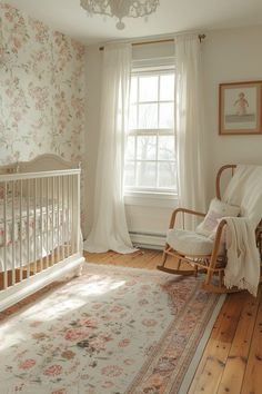 a baby's room with floral wallpaper and rocking chair