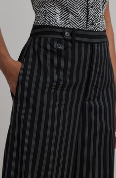 A wide-leg silhouette defines these cotton-blend twill pants patterned in classic stripesfor an ultrasophisticated look. Zip fly with button-tab closure Side-seam pockets; back welt pockets 53% cotton, 31% modal, 16% nylon Hand wash, line dry Imported Classic Pinstripe Wide-leg Bottoms, Classic Straight Pants With Vertical Stripes, Tailored Striped Bottoms With Belt Loops, Classic Striped Wide-leg Pants, Classic Striped Wide Leg Pants, Tailored Black Bottoms With Vertical Stripes, Classic Vertical Stripes Workwear Bottoms, Classic Workwear Bottoms With Vertical Stripes, Cotton Bottoms With Contrast Stripes For Work