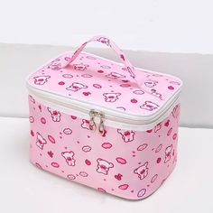 Oh, sweetheart! You need this bag in your collection! It's perfect for travel, toiletries, or carrying a few of your must-have beauty essentials. This cosmetic bag has plenty of room for storage, a carrying handle, and has a cute kawaii pattern with a metal zipper. Details: 23cm*17cm*15.3 cm metal zipper polyester Cute Large Capacity Rectangular Cosmetic Bag, Cute Travel Pouch Bag, Trendy Large Capacity Cosmetic Bag For School, Cute Portable Bags For Travel, Trendy Pink Cosmetic Storage For Travel, Trendy Pink Cosmetic And Toiletry Storage For Travel, Portable Pink Box Bag For Travel, Kawaii Pouch Bag With Zipper Closure, Cute Large Capacity Cosmetic Bag For School