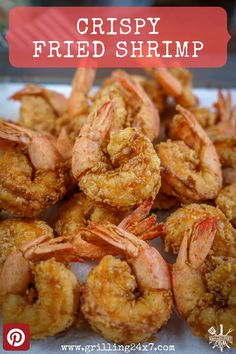 crispy fried shrimp on a plate with text overlay that reads, crispy fried shrimp