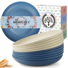 blue and white dinner plates in front of an assortment of boxed items for homely