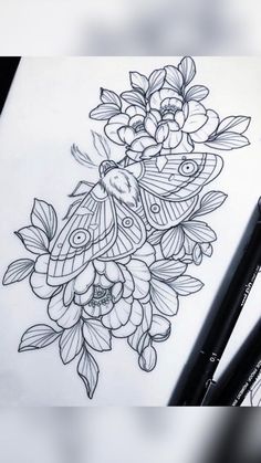 a drawing of flowers and a butterfly on paper