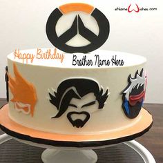 a birthday cake with the name happy birthday to one hero on it and an image of two men