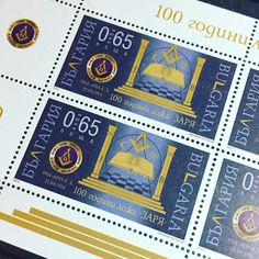 four stamps with the image of a bell on them are shown in three different colors