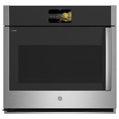 a stainless steel oven with the door open