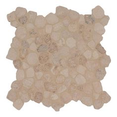 a white and beige tile with small rocks on the bottom, in an irregular pattern