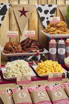 a table filled with lots of different foods and condiments on top of it