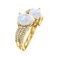 Ross-Simons - Opal and .19 ct. t. w. Diamond Ring in 14kt Yellow Gold. Size 7. Boasting a pair of milky 10x7mm pear-shaped opal cabochons accentuated by .19 ct. t. w. round brilliant-cut diamonds glittering from behind, this ring is a splendid sight to lay eyes on. The exotic gemstones are set on a double band of polished 14kt yellow gold. 1/2" wide. Diamond and opal ring. Opal birthstones are the perfect gift for October birthdays. Pear-shaped White Opal Ring For Anniversary, October Birthdays, Opal And Diamond Ring, Opal Birthstone, Ring Opal, October Birthday, Jewelry Accessories Ideas, Diamond Glitter, Opal Ring