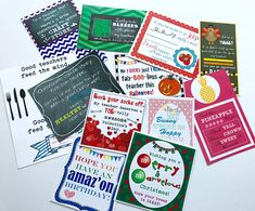 many different types of cards and envelopes on a white surface with the words happy new year