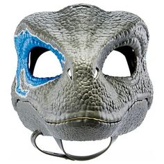 a close up of a mask with blue eyes and an animal's head on it