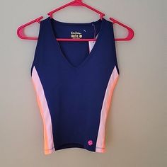 *Brand New* Racerback Athletic Top. Navy Blue With Bright Pink, Orange, And Light Pink Stripes On The Sides. Built In Bra For Support. Chest Tube, Silk Tunic Top, Ruffle Tube Top, Coral Tank, Tassel Top, Printed Sleeveless Top, Athletic Top, Pink Stripes, Pink Orange