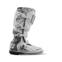 a pair of white motorcycle boots on a white background