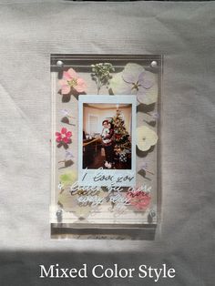 a photo frame with flowers on it and the words mixed color style written in white