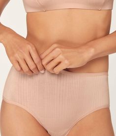 We know a thing or two about bikini bottoms. The Andie underwear version is designed with medium bottom coverage that's perfect for jeans. Pink Soft Touch Shapewear Bottoms, Soft Touch Pink Shapewear Bottoms, Fitted Brief Bottoms For Spring, Supportive High Waist Beige Bottoms, Pink Shapewear Bottoms With Smoothing Details, Pink Seamless Shapewear Bottoms, Pink Seamless Shaping Bottoms, Stretch Brief-style Shapewear Bottoms, Pink Smoothing Brief Bottoms