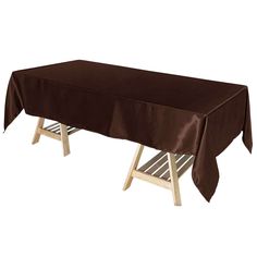 a table covered with a brown cloth