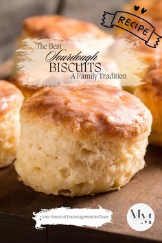 some biscuits are sitting on top of a cutting board with the words, the best cinnamon biscuits a family tradition