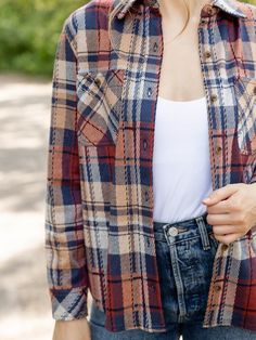 Elevate your fall style with our cozy knit plaid shirt! This collared long sleeve top is perfect for pairing with your favorite cuffed denim, providing both comfort and style. Embrace the season with an effortlessly chic look. Model is wearing a size S. Approx. length 27" measured from a S. 48% Polyester, 47% Rayon, 5% Spandex Trendy Relaxed Fit Flannel Shirt For Fall, Trendy Fall Flannel Button-up Shirt, Trendy Fall Button-up Flannel Shirt, Everyday Plaid Flannel Tops, Trendy Button-up Flannel Shirt For Fall, Plaid Tops For Everyday Winter Wear, Casual Flannel Tops For Fall, Cotton Flannel Shirt For Everyday Fall Wear, Plaid Long Sleeve Top For Fall