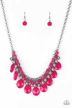 A row of cloudy pink beads gives way to a row of shiny silver beads. Brushed in an opalescent finish, pink teardrops cascade from the bottom of bold interlocking silver chains, creating a dramatically colorful fringe. Features an adjustable clasp closure.

Sold as one individual necklace. Includes one pair of matching earrings. Pink Jewels, Nickel Free Jewelry, Trending Necklaces, Silver Chains, Pink Necklace, Teardrop Beads, Paparazzi Accessories, Teardrop Necklace, Pink Beads