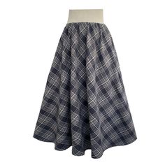 Tale: Pull on our limited edition Bonnie Midi Skirt for a day of adventure. Made from a soft polyester and wool blend, this is the perfect skirt for Autumn/Winter! The side pockets are a must in our busy lives and these can truly fit your phone as well as other essentials. The Gorgeous stretchy deep rib waistband cinches in your waist but feels comfortable against you skin for ultimate comfort. Wear with tights and boots for the perfect cozy look. Our model is 5ft 4" and wears an S with our Beat Small Frocks, Stocking Fillers For Her, Tights And Boots, Wool Wash, Wool Skirt, Fall Skirts, Comfort Wear, Wool Skirts, Independent Designers Fashion