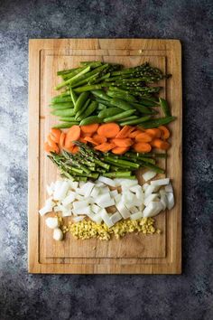 chopped vegetables on a cutting board ready to be cooked