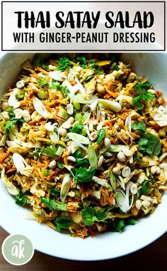 thai salad with ginger - peanut dressing in a white bowl