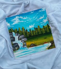 an acrylic painting of a waterfall in the middle of a field with trees