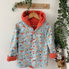 Introducing our versatile line of gender-neutral kids' clothing jackets and coats! Designed with style and comfort in mind, these pieces are perfect for little ones who want to express themselves freely. Made from high-quality materials, each jacket and coat offers warmth and durability, ensuring your child stays cozy throughout the year. With a wide range of colors and patterns to choose from, these jackets and coats are easily mix-and-matchable, allowing for endless outfit possibilities. Whether for playdates or school days, our gender-neutral kids' clothing jackets and coats are a must-have addition to any stylish child's wardrobe. Shop now and let your little one embrace their unique sense of style! Product Features:  ◆Material: 100% Cotton OEKO-TEX® certified tricot fabric ◆Color: Bro Adjustable Hood Long Sleeve Outerwear For Playtime, Cotton Outerwear With Adjustable Hood For Playtime, Fall Hooded Outerwear For Playtime, Winter Long Sleeve Outerwear For Playtime, Fleece-lined Outerwear For Playtime In Fall, Winter Cotton Hooded Jacket For Playtime, Fleece-lined Outerwear For Fall Playtime, Hooded Outerwear With Fleece Lining For Playtime, Winter Outerwear With Adjustable Hood For Playtime