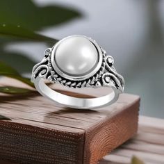 Faux Pearl And Silver Tone Ring. Available In Several Sizes. In New Condition. Nwt Trendy White Rings For Anniversary, Trendy White Open Ring, Trendy White Wedding Ring, Trendy Adjustable White Rings, Trendy White Adjustable Rings, Classic White Pearl Open Ring, Vintage White Open Ring, Vintage White Open Ring Jewelry, Ring Color