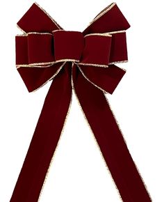 a red bow with gold sequins on the top and bottom, tied to a white background