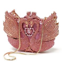 These Lovebirds evening handbag is a marvelous art, perfectly covered in brilliant pink crystals. This stunning bag is complete with gold color hardware and removable gold snap hook chain. This marvelous soulmate art bag can be carry in hand with or without chain. Glamorous and functional, this clutch can hold securely your keys, cards, cash and other small necessities.   Details: Measurement: 7.5in length x 5in high x 2in width Color: Pink crystals Lining: golden vegan leather Closure: magnetic closure Chain length: 19in Soulmate Art, Formal Evening Wear, Cute Purse, My Bags, Art Bag, Evening Handbag, Embroidered Bag, Cute Purses, Evening Clutch Bag