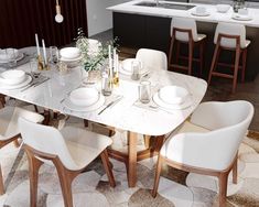 a dining room table with white chairs and plates on it