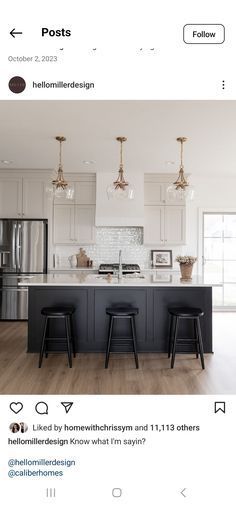 an instagramted photo of a kitchen with three stools in front of the island