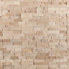 a white and tan brick wall with no mortars or mortars on the side