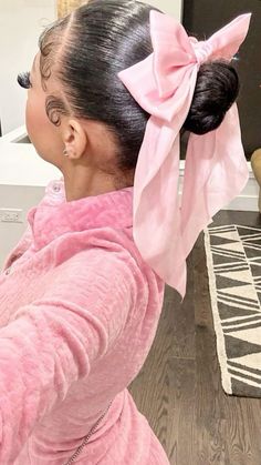 Pink bow, bow hairstyle, slick back bun, pink outfit, black women, hairstyles Buns Hairstyles Black Women, It Girl Hairstyles Black Women, Pink Bow Hairstyles Black Women, Cute Bun Hairstyles With Braid, Heart Buns Hairstyle Black Women, Natrual Black Girls Hairstyles Slick, Buns Natural Hair Black Women, Bows Black Women, Bun And Bow Hairstyles