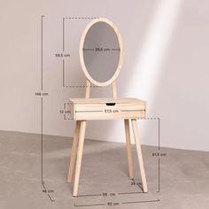 a wooden vanity table with a mirror on it and measurements for the top shelf below