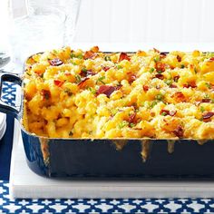 a casserole dish with macaroni and cheese in it on a table