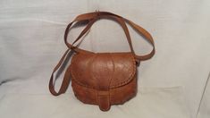 Vintage 1970's handmade light brown leather handbag - shoulder bag - NEW. Measurements: H - 5 1/2'' [ 14cm.] W - 7 1/2'' [ 19cm.] Side - 1 2/5'' [ 3.5cm.] Leather long hadle - 35 1/2'' [ 90cm.] UNUSED. NOTE: All vintage items in my shop that are used have been restored according to the possibilities All defects are removed,except the normal signs of use over the years. Thank you and successful shopping. Vintage Handmade Satchel For Everyday Use, Handmade Vintage Satchel For Everyday Use, Vintage Light Brown Shoulder Bag With Adjustable Strap, Vintage Light Brown Crossbody Shoulder Bag, Vintage Light Brown Satchel For Daily Use, Vintage Light Brown Satchel Shoulder Bag, Vintage Light Brown Satchel For Travel, Handmade Retro Brown Shoulder Bag, Handmade Vintage Brown Shoulder Bag