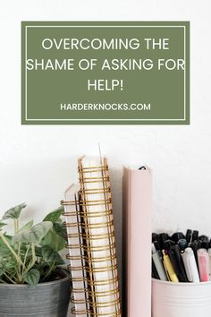 a desk with books and plants on it, text overlay reads overcoming the shame of asking for help