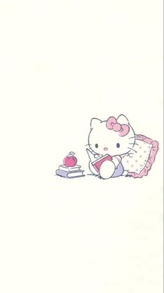 an image of a hello kitty on the bed