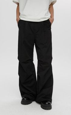 Pleated Parachute Cargo Pants offer style and comfort with their unique pleated design. Perfect for casual wear, these cargo pants are ideal for any wardrobe. Available Sizes: Size (cm) S M L XL Waist 70 74 76 82 Length 104 106 108 110 Hip 102 106 110 114 Baggy Pleated Wide-leg Pants, Casual Cotton Pleated Wide Leg Pants, Casual Solid Pleated Pants, Casual Pleated Baggy Bottoms, Casual Black Pleated Wide Leg Pants, Casual Black Wide Leg Pleated Pants, Casual Full Length Pleated Pants, Cotton Wide-leg Pleated Pants, Pleated Cotton Wide-leg Pants