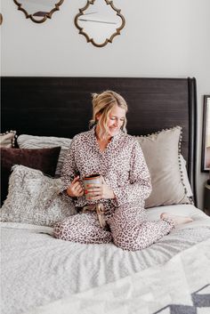 Enjoy a night in the right way with the cutest pajama set. This leopard pajama set includes a long sleeve button down top and pants in a trendy light pink leopard print. Grab a glass of wine, your girlfriends, and a rom-com movie to complete the night. 65% Cotton, 35% Polyester Model is 5'6", size 34B bust, size 26" waist, and shown wearing a size small Fit is true to size Elastic waist band Faux drawstring Cheetah Print Pajamas Satin, Women Pink Flannelette Polka Dots Pajama, Leopard And Flower Pjs, Leopard Pajamas, Date Night Fashion, Cute Pajama Sets, Casual Date Night, A Glass Of Wine, Spirit Week