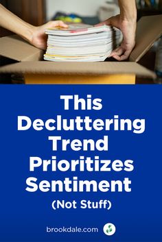 a stack of books with the title this decluttering trend prioritizes sentiment not stuff