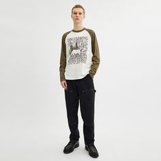 100% organic cotton Length: 28 1/2 Machine wash Model is 6'2 (188cm) and wears a size M Style No. CT744 Fall Raglan Sleeve T-shirt For Streetwear, Winter Cotton Crew T-shirt, Casual Long Sleeve Cotton T-shirt, Cotton Raglan Sleeve Sweatshirt With Graphic Print, Long Sleeve Organic Cotton Tops For Streetwear, Casual Cotton T-shirt With Raglan Sleeves, Casual Organic Cotton Sweatshirt With Letter Print, Cotton Long Sleeve Graphic Tee, Screen Print Cotton Crew Neck Top