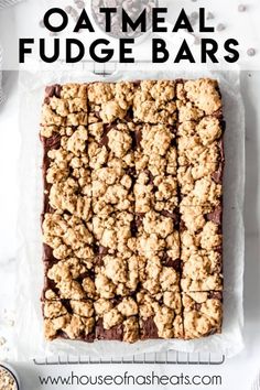 These simple but decadent Oatmeal Fudge Bars are a mash-up of two of our favorite dessertssoftchewy oatmeal cookie on top and bottom with a thick layer of rich chocolate fudge in the middle. Oatmeal Fudge, Chewy Oatmeal Cookie, Creamy Chocolate Fudge, Cookies Easy Recipe, Oatmeal Fudge Bars, Chewy Oatmeal Cookies, The Best Oatmeal, Bars Cookies, Craving Sweets