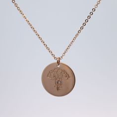 Celebrate their birthday with this dazzling Diamond Birth Flower Necklace. Each necklace features a stunning diamond and a unique birth flower charm, making it a perfect personalized gift. Show them how much you care (and know them) with this gorgeous and meaningful piece. Materials: 14k Gold Fill | 14k Rose Gold Fill | Sterling Silver Measurements: 16" chain, 18" chain Pendant: 5/8" coin Rose Gold Medallion Jewelry With Birth Flower, Rose Gold Engraved Flower Pendant Charm Necklaces, Rose Gold Birth Flower Charm Necklaces, Rose Gold Birth Flower Charm Necklace, Elegant Birthstone Medallion Charm Necklace, Elegant Medallion Charm Necklace With Birthstone, Diamond Charm Necklace With Round Pendant For Gift, Rose Gold Medallion Necklace For Anniversary, Rose Gold Round Pendant Birthstone Necklace As Gift