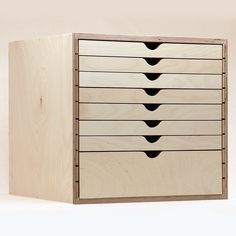 a wooden drawer with six drawers on it