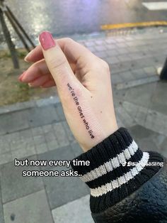 a woman's hand with a small tattoo saying, but now every time someone asks