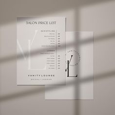 a salon price list sitting on top of a table